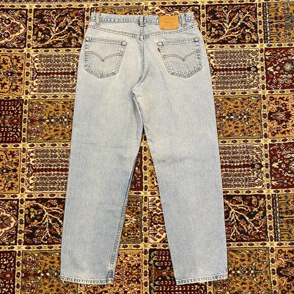 Vintage 90s Levi's 550 Relaxed Tapered fit light wash jeans - Picture 1 of 5